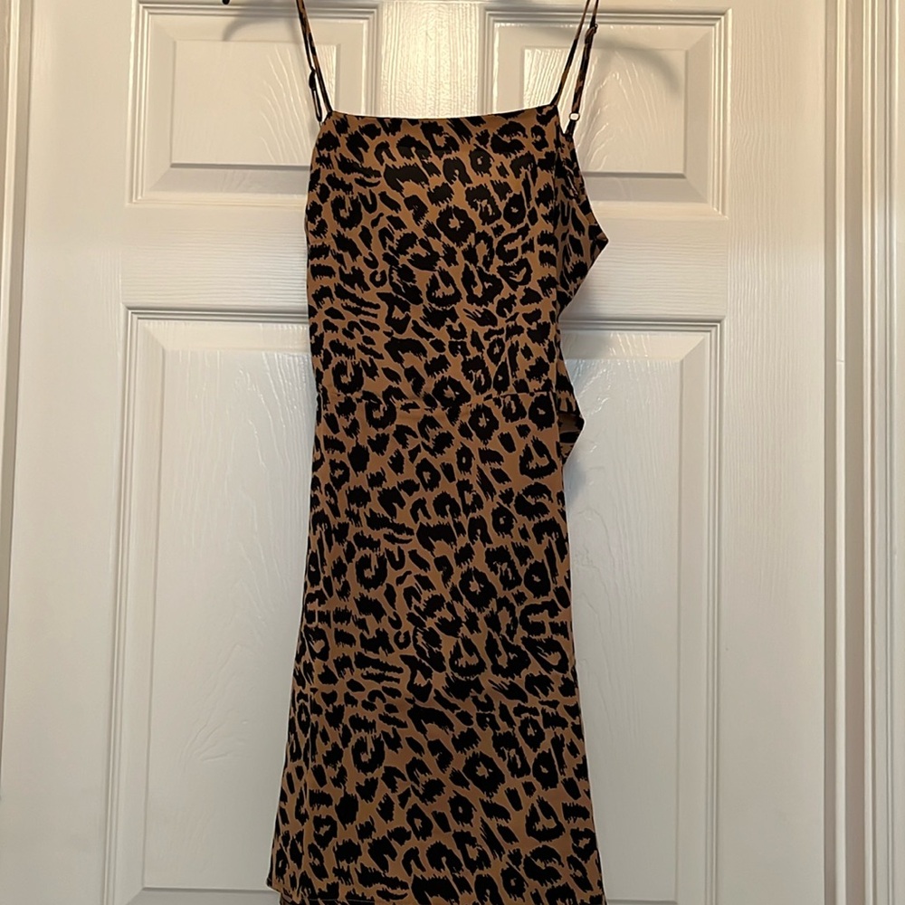 Stylish Stunner Open Back Leopard Mini Dress size medium.